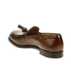 Mocassins en cuir marron avec détail pompon