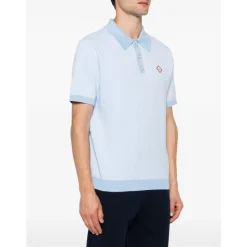 Polo en maille à manches courtes et rayures tennis